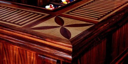 This Glenn Rieder project for the Grand Hyatt in Kauai involved the use of etched glass, bamboo, hand carvings, tappa cloth, lauhala matting, patina finished metals, artifacts, and taxidermy.