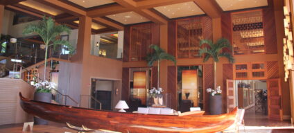 Teak and mahogany paneling are featured throughout several areas