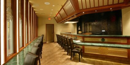 Glenn Rieder’s scope of work included perimeter millwork walls, etched glass, fiberglass ceiling panels, bar fixtures, wall paneling and stone.