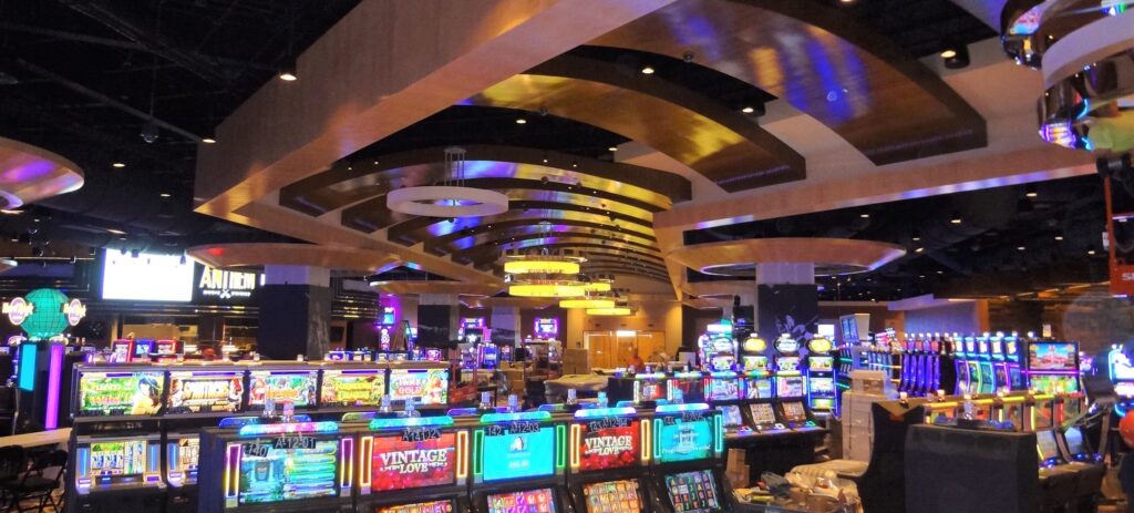 Glenn Rieder completed a state-of-the-art gaming project highlighted by the memorabilia cases manufactured out of polished stainless steel and anigre veneers.