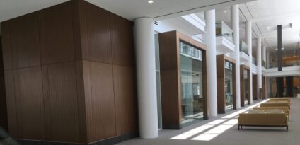 This custom high end interior with architecturally significant millwork and innovative craftsmanship was produced by Glenn Rieder for multiple facilities within the Northwestern Mutual Life Towers and Commons.